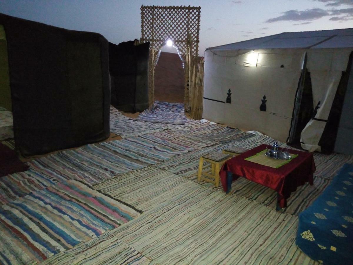Отель Sahara Camel Tours Camp Мерзуга Экстерьер фото